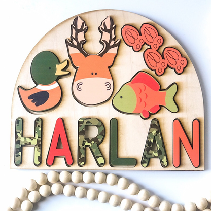Sportsman name puzzle with deer, mallard duck and fish for kids