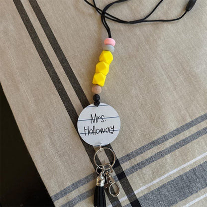 Breakaway pencil notebook lanyard, ID badge holder
